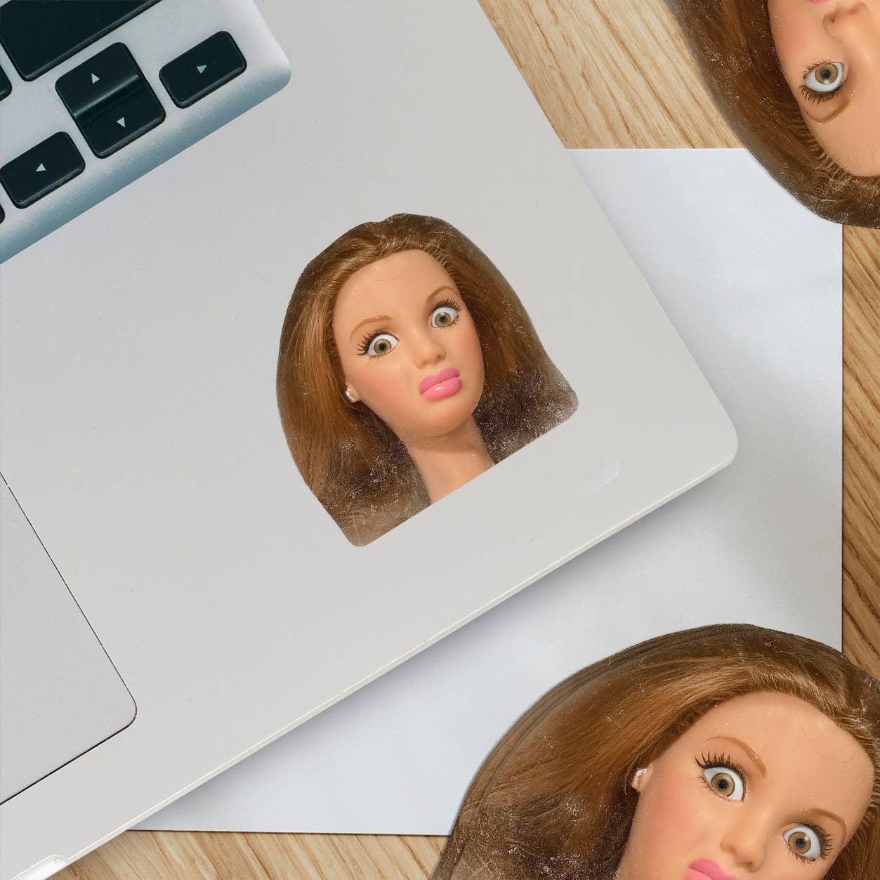 Funny Doll Face – Vinyl Sticker: 2" tall