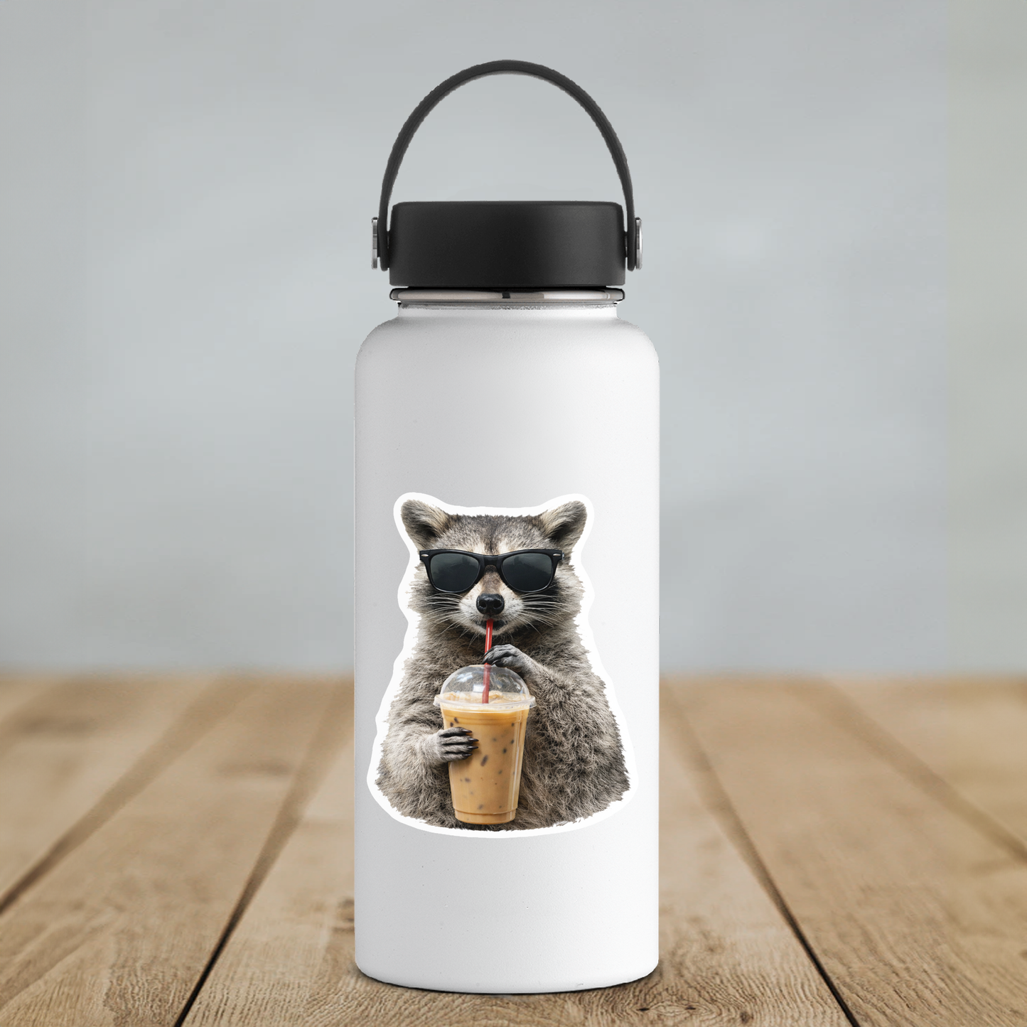 Cool Raccoon Iced Coffee Vinyl Sticker: 2" tall